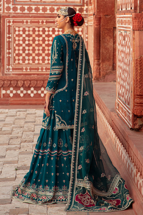 Rear view of Zamurd shirt showing back embroidery, adda motifs and seamless finish.